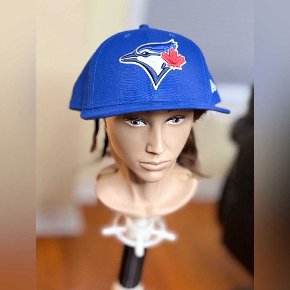 New Era Royal Blue Toronto Blue Jays Fitted Cap with Red Maple Leaf Logo